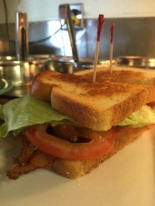 A freshly made BLT sandwich at Red Rock Cafe and Back Door BBQ in Napa Valley CA
