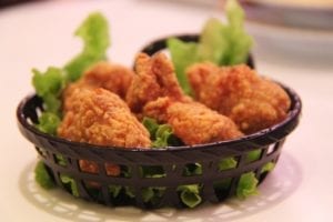 Delicious chicken fingers in a basket